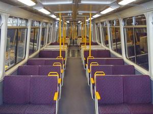 Seating and aisle view in an EMU carriage