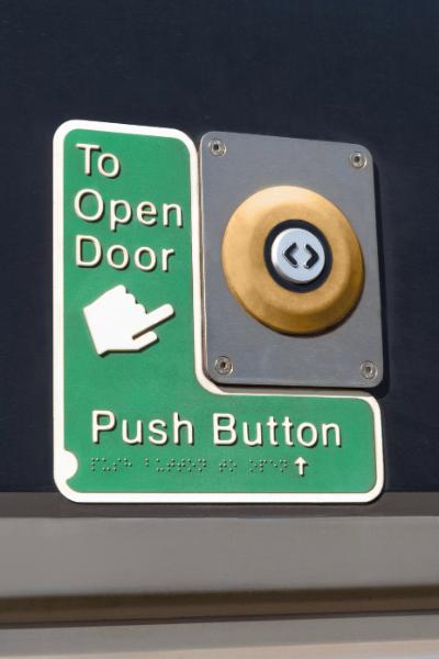 Door open button outside an SMU 260 carriage